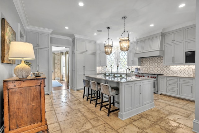 328 White Swans Xing, Brentwood, TN 37027 - kitchen with recessed lighting, backsplash, high end stove, stone tile flooring, and custom range hood