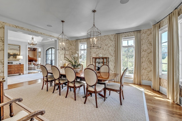 328 White Swans Xing, Brentwood, TN 37027 - dining space with crown molding, plenty of natural light, an inviting chandelier, and wood finished floors