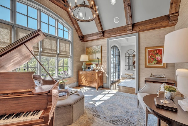 328 White Swans Xing, Brentwood, TN 37027 - sitting room with beamed ceiling, high vaulted ceiling, an inviting chandelier, wood finished floors, and baseboards