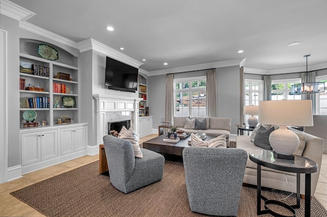 328 White Swans Xing, Brentwood, TN 37027 - living area featuring built in features, an inviting chandelier, ornamental molding, recessed lighting, and a premium fireplace