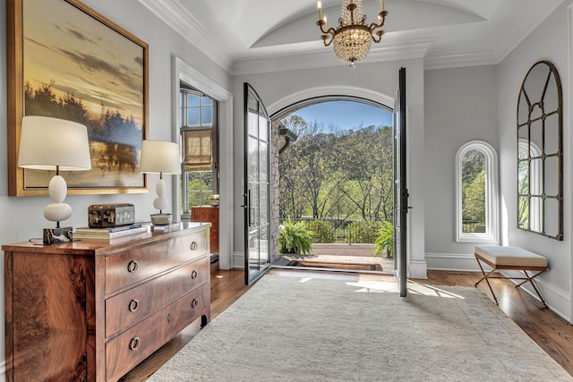 328 White Swans Xing, Brentwood, TN 37027 - entrance foyer with wood finished floors, a notable chandelier, and crown molding