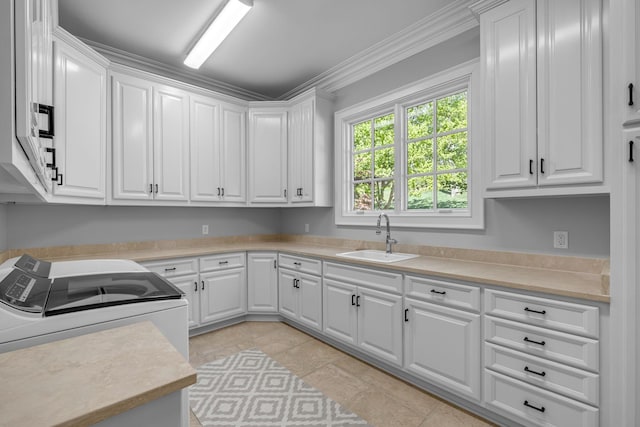 328 White Swans Xing, Brentwood, TN 37027 - laundry area featuring a sink, crown molding, and cabinet space