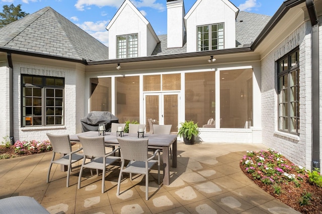 328 White Swans Xing, Brentwood, TN 37027 - view of patio / terrace with a sunroom and outdoor dining space