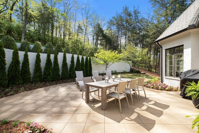 328 White Swans Xing, Brentwood, TN 37027 - view of patio featuring outdoor dining area, a fenced backyard, and area for grilling
