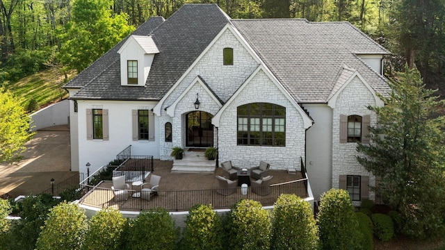 328 White Swans Xing, Brentwood, TN 37027 - french country home with stone siding and roof with shingles