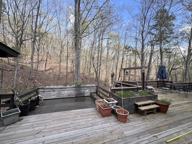 deck featuring outdoor dining area