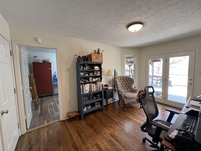 office featuring a textured ceiling and wood finished floors
