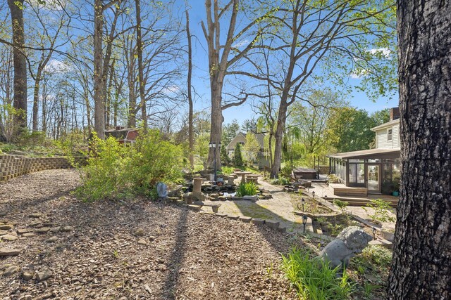 124 Timber Trail Dr, Lebanon, TN 37090 - view of yard featuring a wooden deck and a sunroom