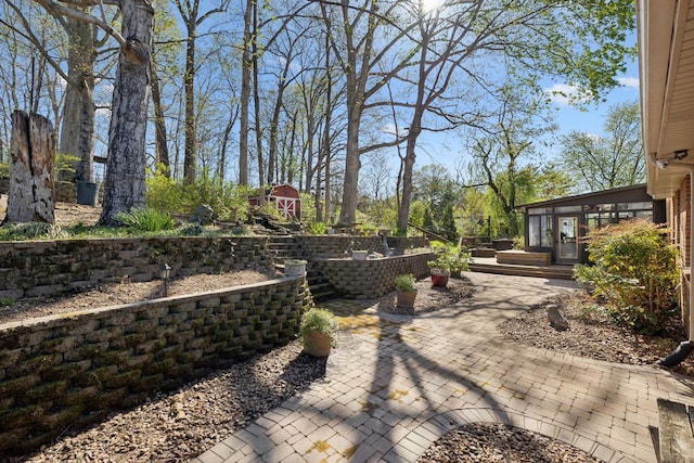 124 Timber Trail Dr, Lebanon, TN 37090 - exterior space with a sunroom, an outbuilding, and a storage shed