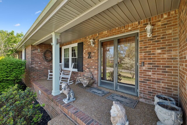 124 Timber Trail Dr, Lebanon, TN 37090 - entrance to property featuring brick siding and a porch