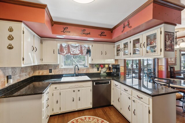 124 Timber Trail Dr, Lebanon, TN 37090 - kitchen with a sink, dishwasher, a peninsula, ornamental molding, and dark wood-style floors