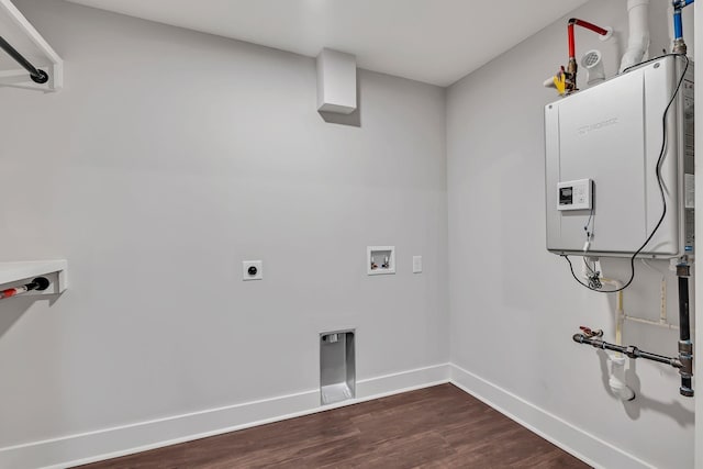 washroom featuring laundry area, hookup for a washing machine, dark wood-type flooring, hookup for an electric dryer, and baseboards