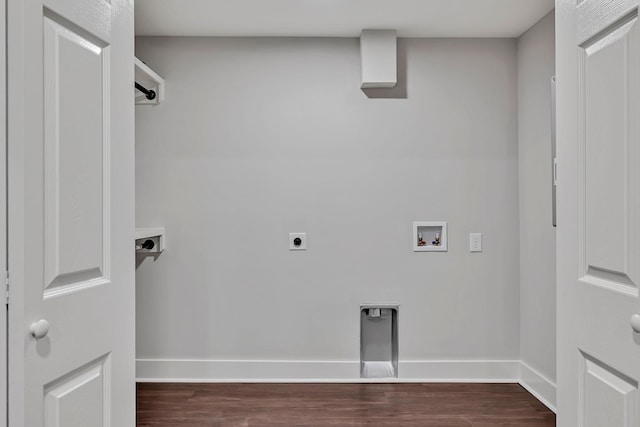 laundry area featuring laundry area, dark wood finished floors, hookup for a washing machine, hookup for an electric dryer, and baseboards