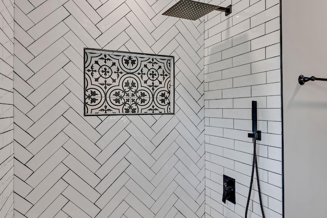 bathroom with a tile shower
