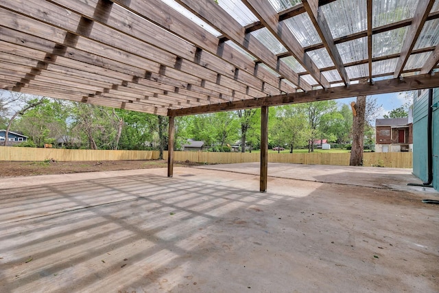 view of patio with fence and a pergola