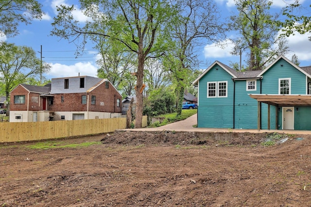 view of yard with fence