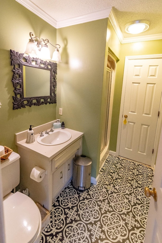 full bathroom featuring a shower stall, tile patterned floors, crown molding, and toilet