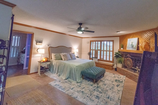 bedroom with crown molding, wood walls, ceiling fan, and a textured ceiling