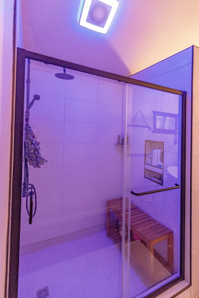 full bath with visible vents and a stall shower
