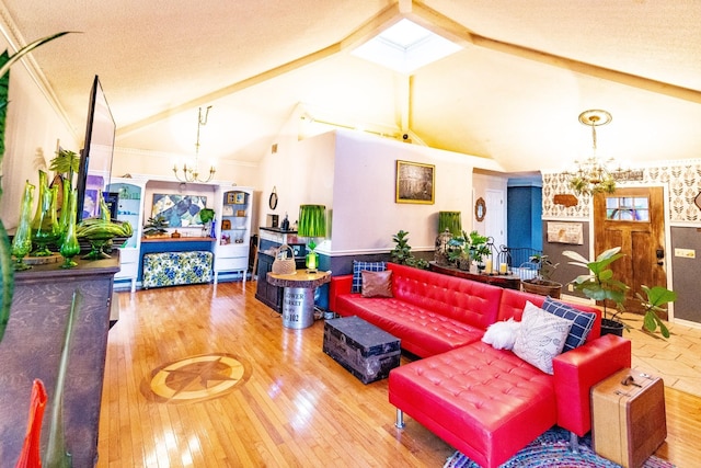 living area featuring wood-type flooring, vaulted ceiling with beams, and a notable chandelier