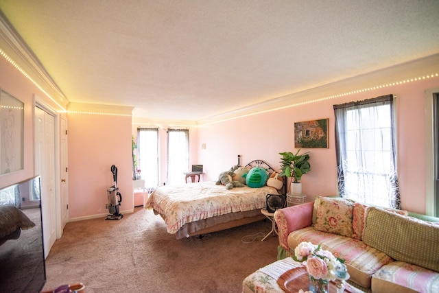 bedroom featuring ornamental molding and carpet