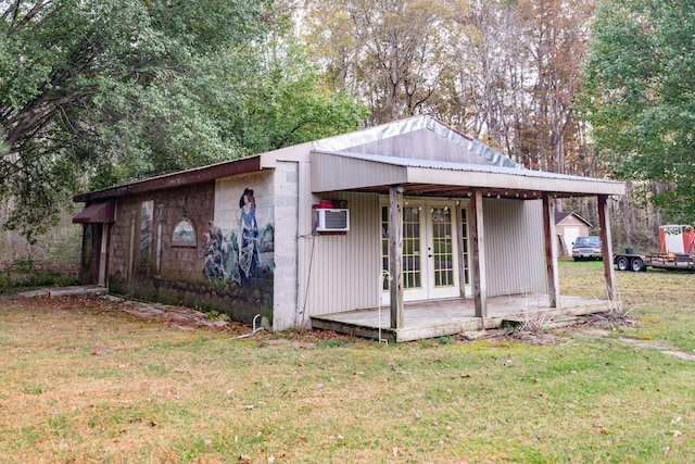 view of outbuilding with french doors