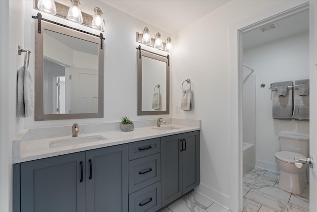 22 Flip Flop Ct, Winchester, TN 37398 - bathroom featuring marble finish floor, a sink, double vanity, and toilet