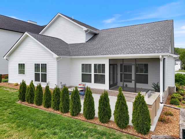 22 Flip Flop Ct, Winchester, TN 37398 - view of front of property featuring a sunroom, a patio area, a shingled roof, and a front yard