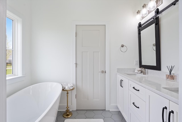 22 Flip Flop Ct, Winchester, TN 37398 - bathroom with a soaking tub, a sink, and double vanity