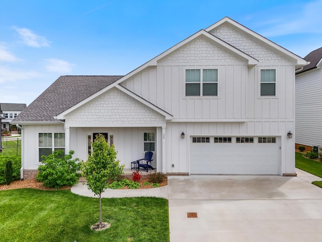 22 Flip Flop Ct, Winchester, TN 37398 - view of front facade featuring concrete driveway, a front lawn, and board and batten siding
