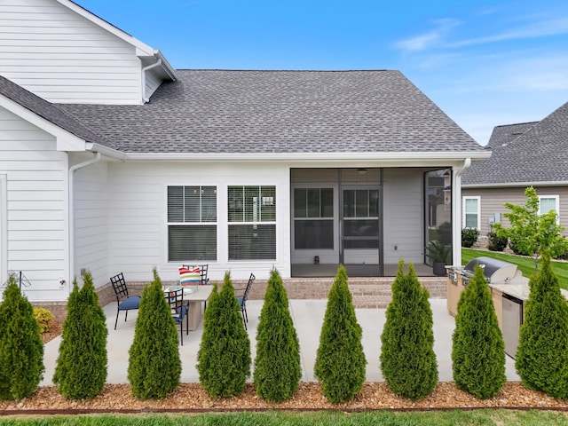 22 Flip Flop Ct, Winchester, TN 37398 - view of front of home featuring a patio area, a sunroom, and roof with shingles
