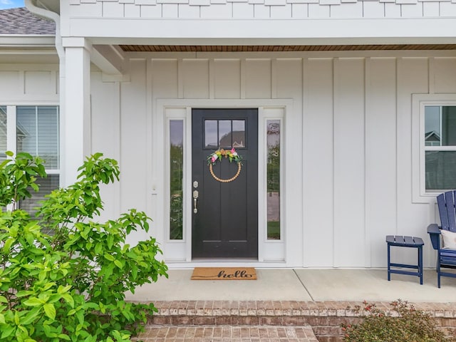 22 Flip Flop Ct, Winchester, TN 37398 - doorway to property featuring board and batten siding and roof with shingles