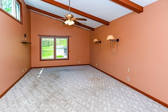 empty room with plenty of natural light, carpet, baseboards, and ceiling fan