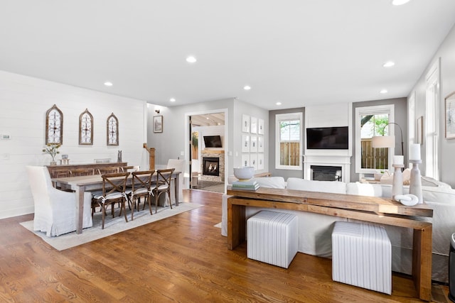 4008 Nevada Ave, Nashville, TN 37209 - living room featuring a glass covered fireplace, recessed lighting, and wood finished floors
