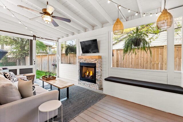 4008 Nevada Ave, Nashville, TN 37209 - sunroom / solarium with beam ceiling, an outdoor living space with a fireplace, and plenty of natural light