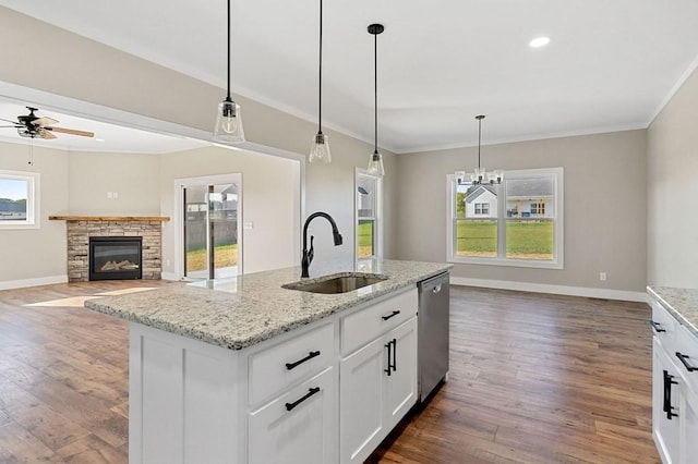 2717 Autumn Woods Trl, Cookeville, TN 38501 - kitchen with a sink, dishwasher, baseboards, ornamental molding, and wood finished floors