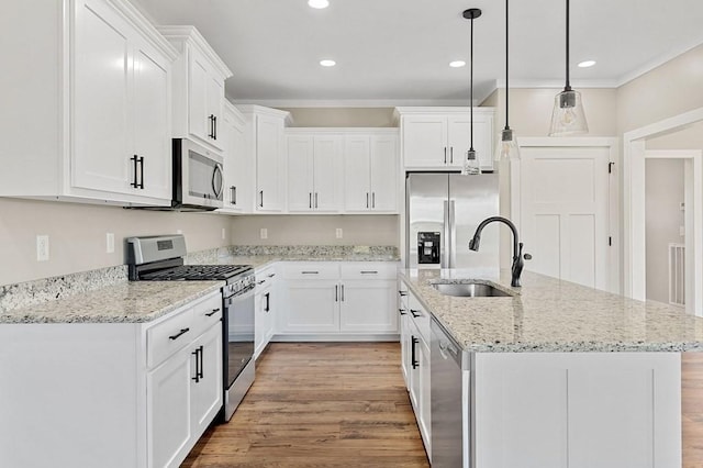 2717 Autumn Woods Trl, Cookeville, TN 38501 - kitchen featuring stainless steel appliances, a sink, white cabinetry, a center island with sink, and recessed lighting