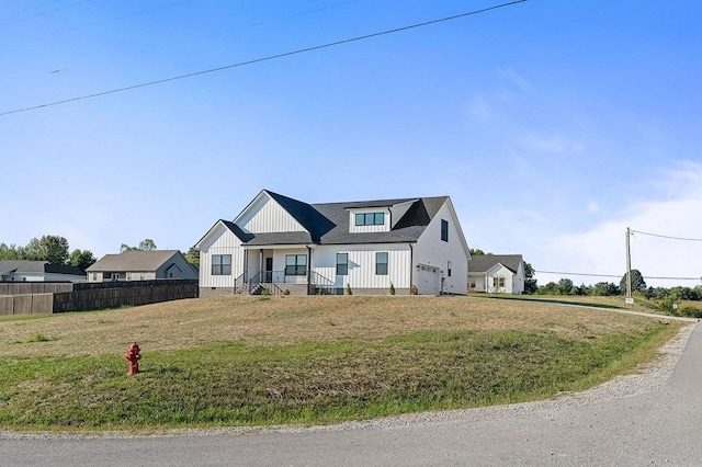 2717 Autumn Woods Trl, Cookeville, TN 38501 - view of front facade with board and batten siding and a garage