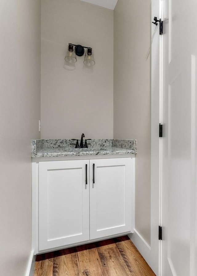 2717 Autumn Woods Trl, Cookeville, TN 38501 - bathroom with a sink, wood finished floors, and baseboards