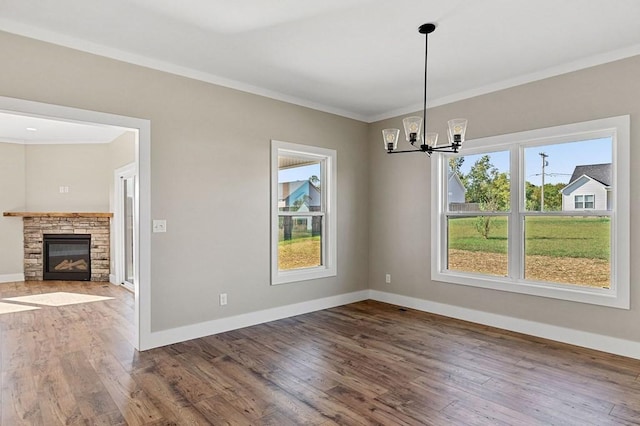 2717 Autumn Woods Trl, Cookeville, TN 38501 - unfurnished dining area featuring ornamental molding, wood finished floors, a chandelier, and baseboards