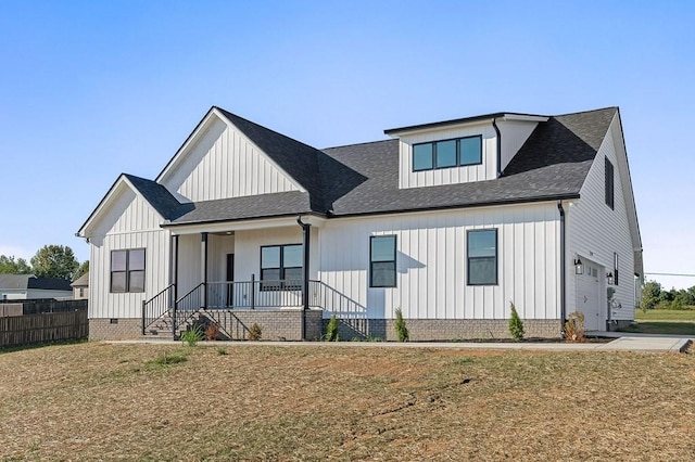 2717 Autumn Woods Trl, Cookeville, TN 38501 - modern farmhouse with covered porch, board and batten siding, a garage, fence, and stairway