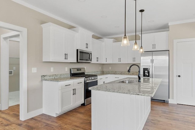 2717 Autumn Woods Trl, Cookeville, TN 38501 - kitchen featuring appliances with stainless steel finishes, a sink, ornamental molding, and white cabinetry