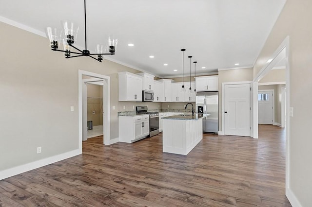 2717 Autumn Woods Trl, Cookeville, TN 38501 - kitchen with appliances with stainless steel finishes, ornamental molding, baseboards, a chandelier, and white cabinets