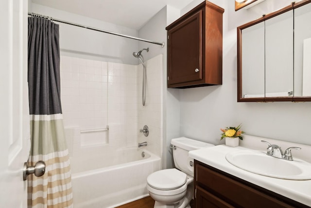 full bath with toilet, shower / tub combo, and vanity
