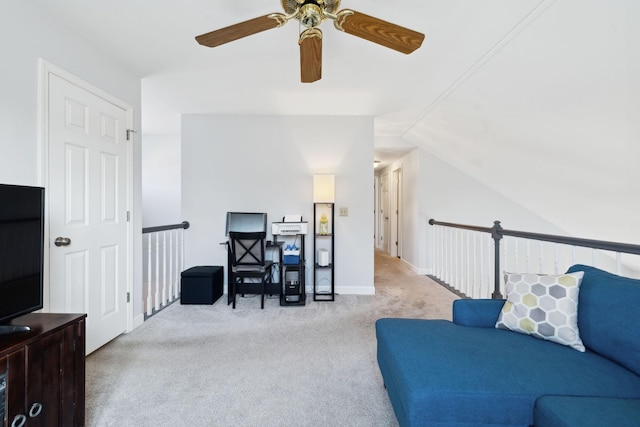carpeted living area with a ceiling fan and lofted ceiling