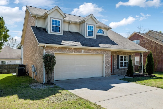 traditional-style house featuring brick siding, central AC unit, fence, and concrete driveway