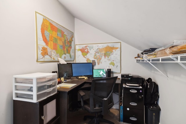 home office featuring lofted ceiling