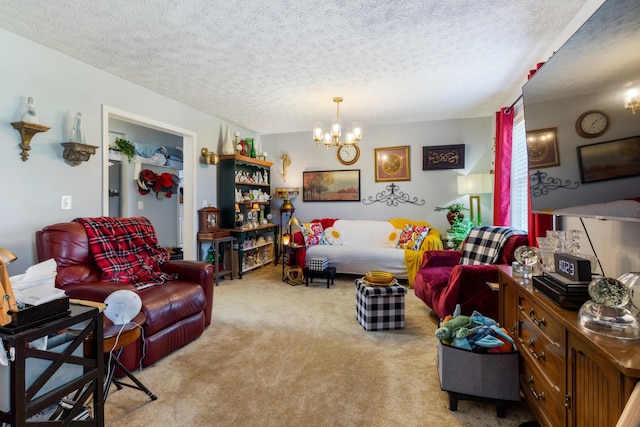 living area with carpet, a textured ceiling, and an inviting chandelier