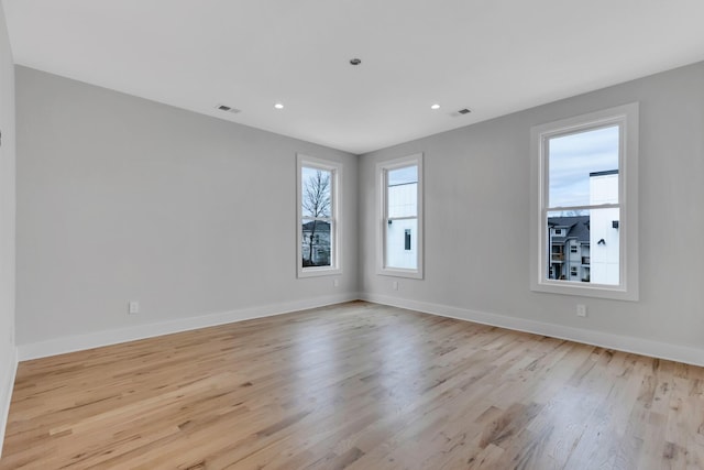 6376A Ivy St, Nashville, TN 37209 - unfurnished room featuring light wood-type flooring, baseboards, visible vents, and recessed lighting