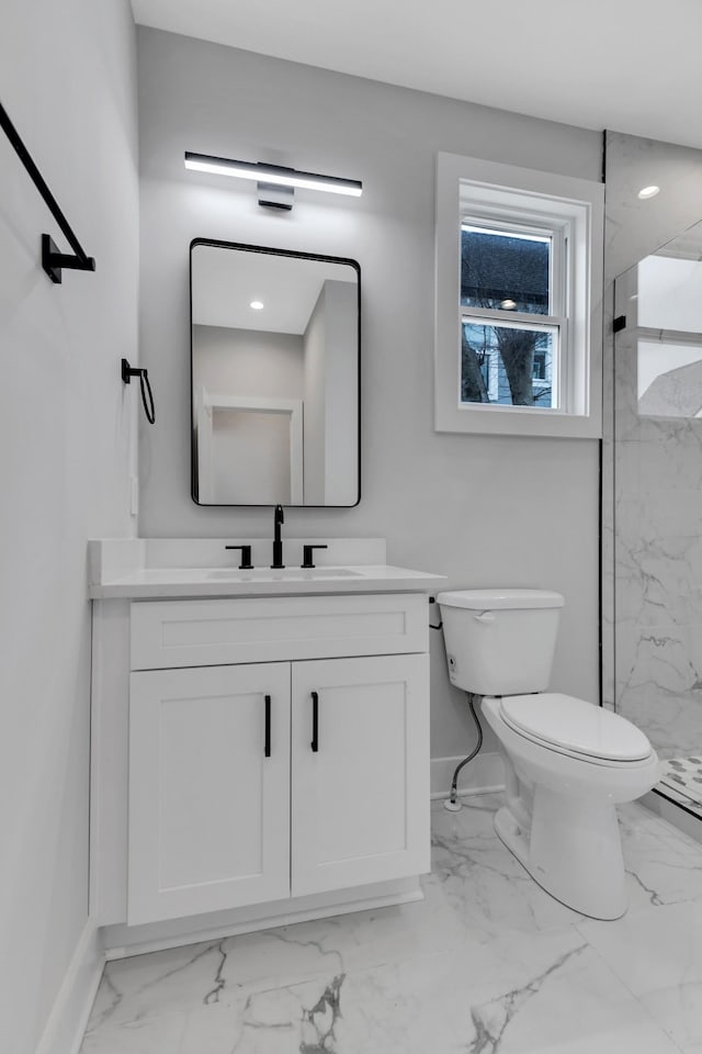 6376A Ivy St, Nashville, TN 37209 - full bath featuring vanity, toilet, marble finish floor, a marble finish shower, and baseboards